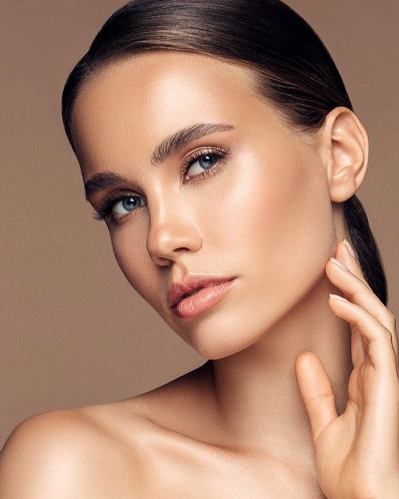 Editorial beauty portrait showing softly shaded natural looking brows